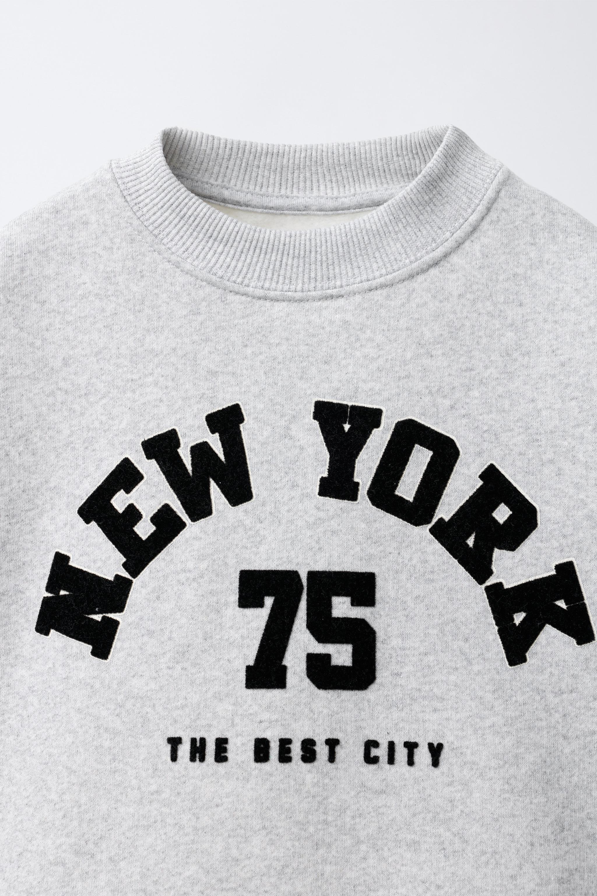 FLOCKED TEXT PRINT SWEATSHIRT